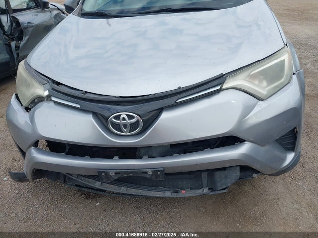 2T3ZFREV4GW306588 Toyota RAV4 LE