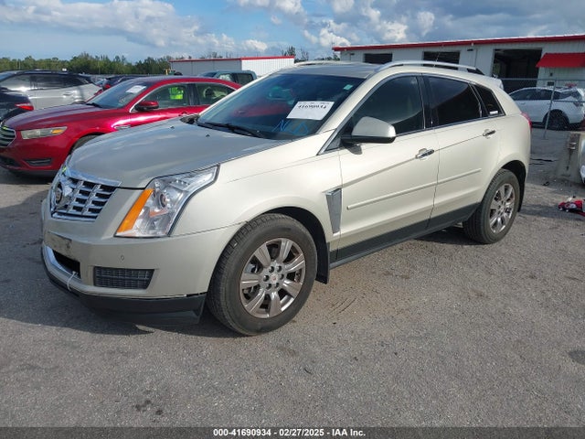 2014 CADILLAC SRX 3GYFNBE34ES566697 Photo 1