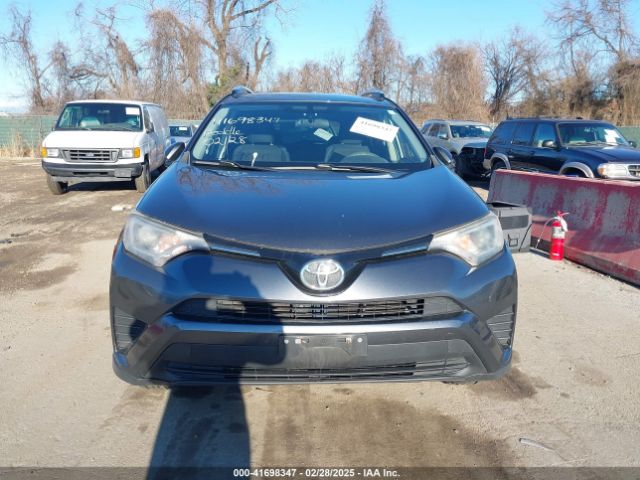 JTMBFREV9GD196216 Toyota RAV4 LE