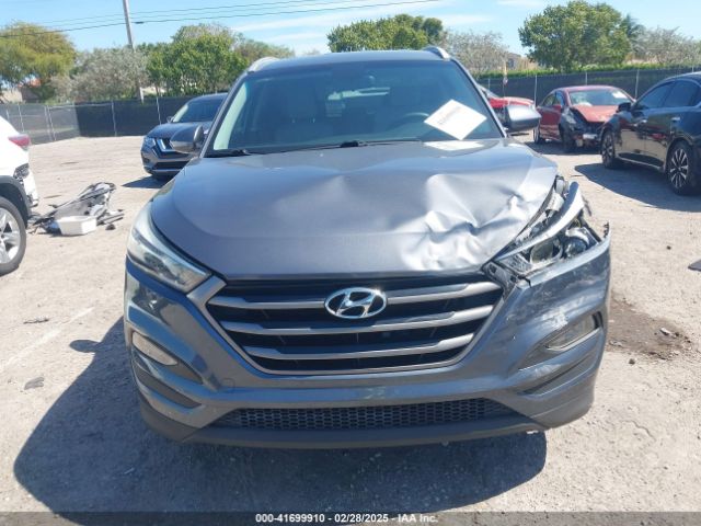 KM8J33A40GU106591 Hyundai TUCSON SE