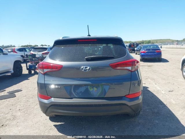 KM8J33A40GU106591 Hyundai TUCSON SE