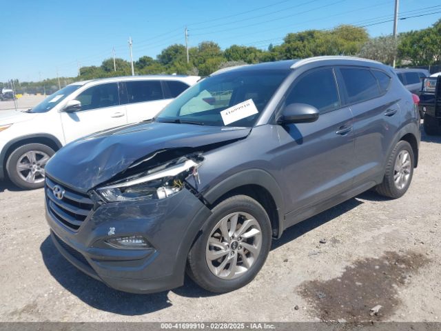 KM8J33A40GU106591 Hyundai TUCSON SE