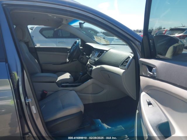 KM8J33A40GU106591 Hyundai TUCSON SE
