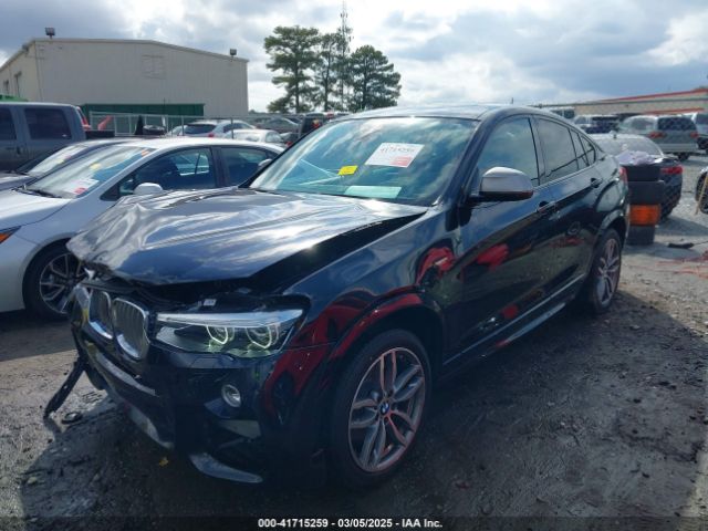 2018 BMW X4 5UXXW7C52J0W63809 Photo 1