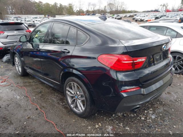 2018 BMW X4 5UXXW7C52J0W63809 Photo 2