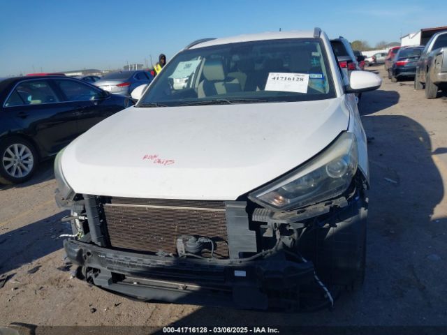 KM8J3CA48GU248042 Hyundai TUCSON SE