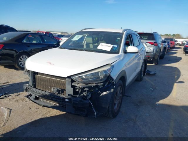 KM8J3CA48GU248042 Hyundai TUCSON SE