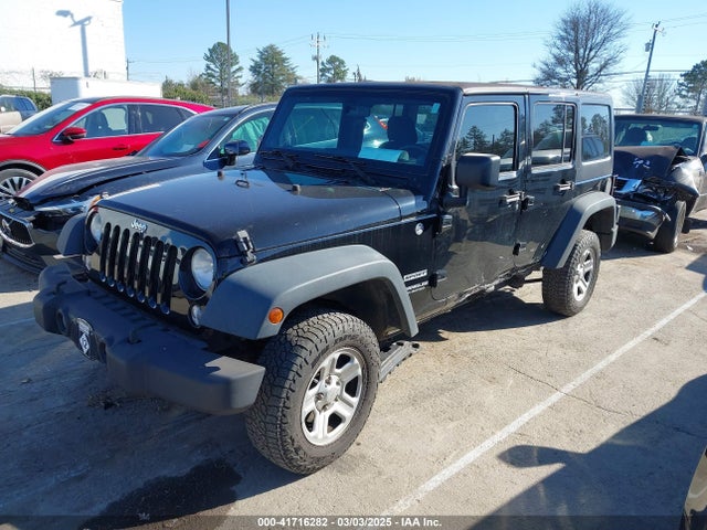 1C4BJWDG4EL258026 Jeep Wrangler Unlimited Sport
