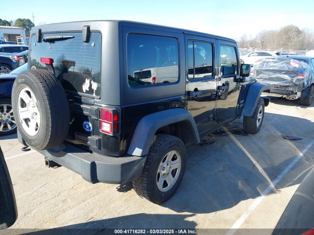 1C4BJWDG4EL258026 Jeep Wrangler Unlimited Sport