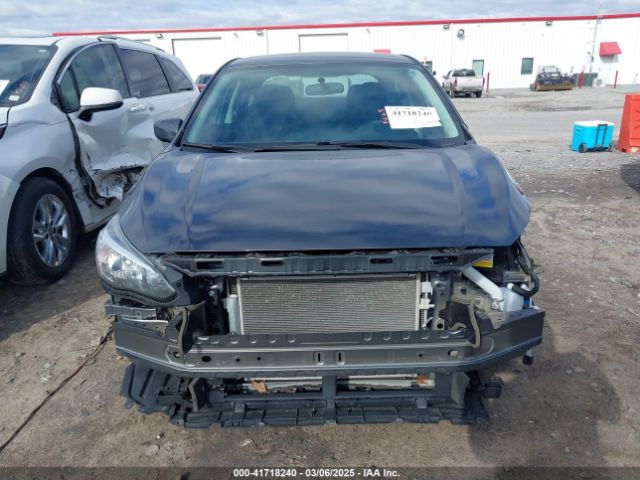 4S3GKAA69J3610724 Subaru Impreza 2.0i
