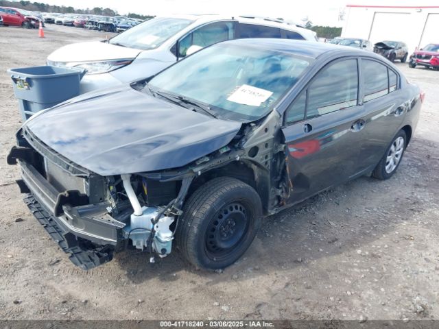 4S3GKAA69J3610724 Subaru Impreza 2.0i