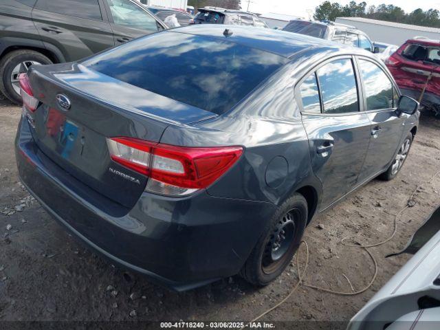 4S3GKAA69J3610724 Subaru Impreza 2.0i