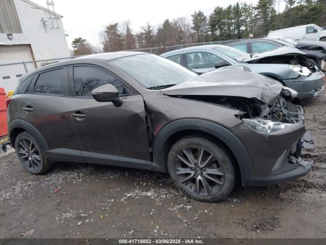 JM1DKFC70J0320122 Mazda Cx-3 Touring