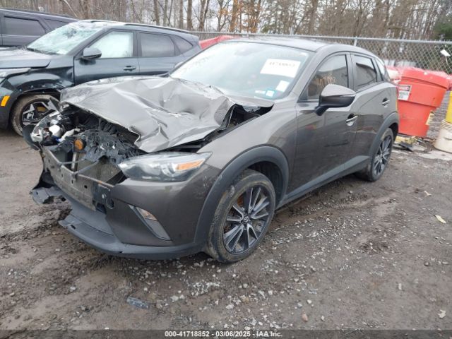 JM1DKFC70J0320122 Mazda Cx-3 Touring