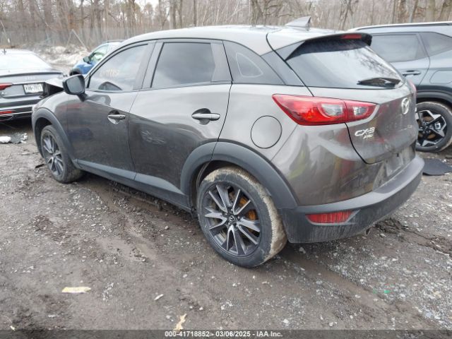 JM1DKFC70J0320122 Mazda Cx-3 Touring