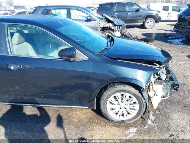 4T1BF1FK7EU303911 Toyota CAMRY LE
