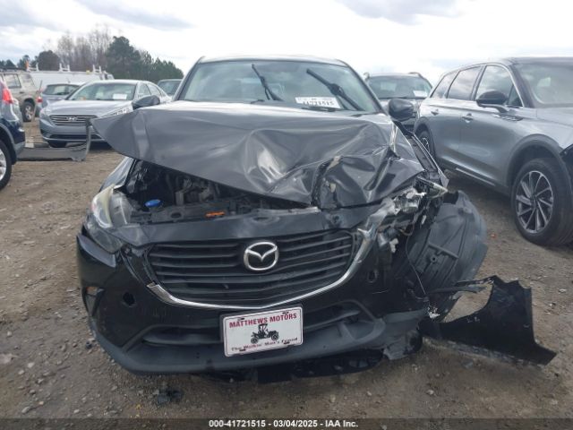 JM1DKFC70H0163315 Mazda Cx-3 Touring