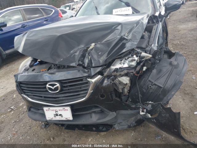 JM1DKFC70H0163315 Mazda Cx-3 Touring