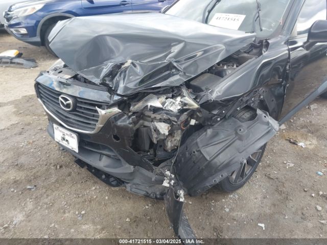 JM1DKFC70H0163315 Mazda Cx-3 Touring