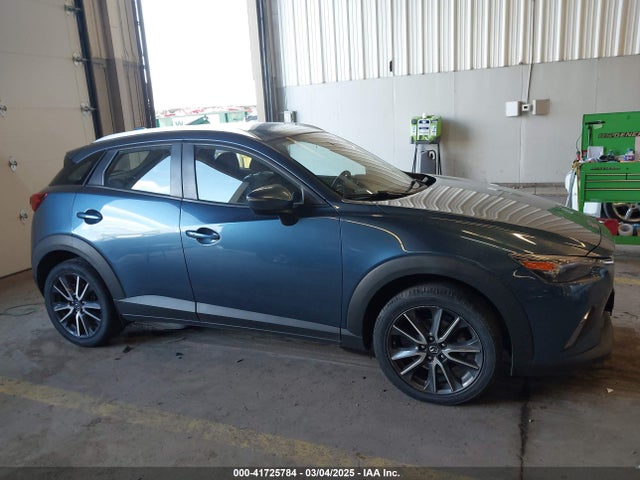 JM1DKFC78J1323439 Mazda Cx-3 Touring
