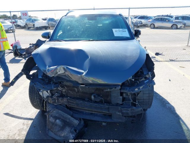 KM8J33A40GU109703 Hyundai TUCSON SE