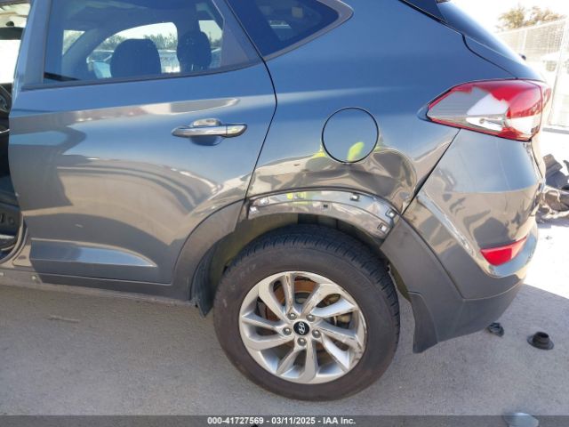 KM8J33A40GU109703 Hyundai TUCSON SE