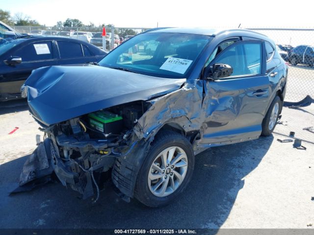KM8J33A40GU109703 Hyundai TUCSON SE