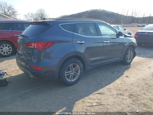 5NMZUDLB1HH023962 Hyundai Santa Fe Sport 2.4l