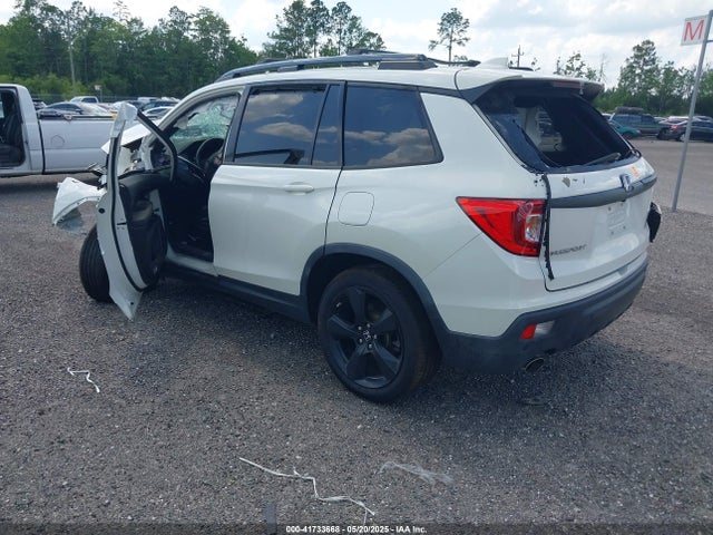 5FNYF7H91KB001286 Honda Passport Touring