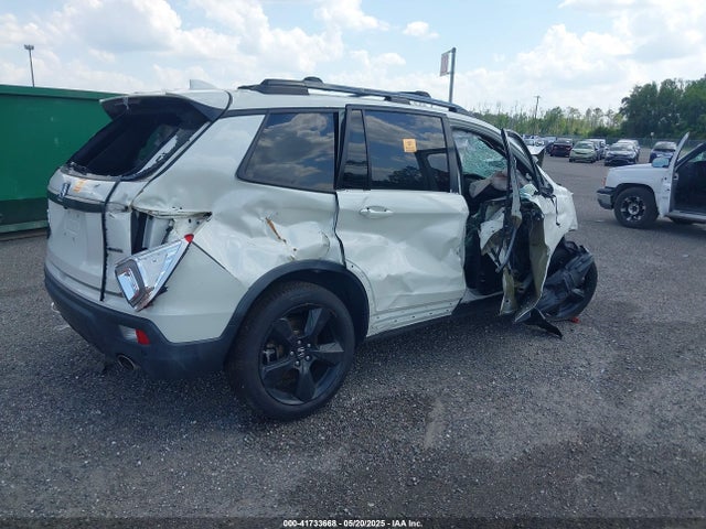 5FNYF7H91KB001286 Honda Passport Touring