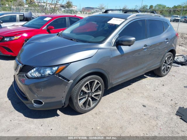 JN1BJ1CR0JW283460 Nissan Rogue Sport Sl