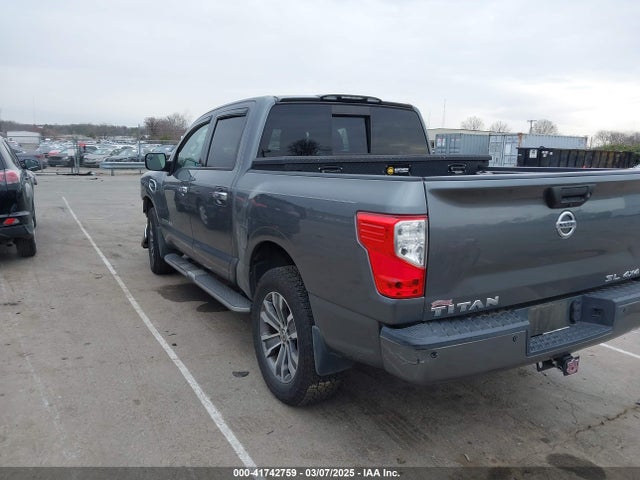 1N6AA1E57HN504214 Nissan Titan Sl