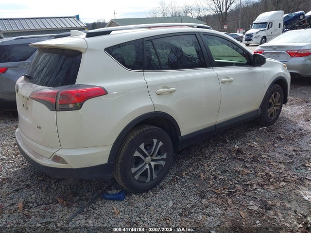 JTMZFREV8JJ187790 Toyota RAV4 LE