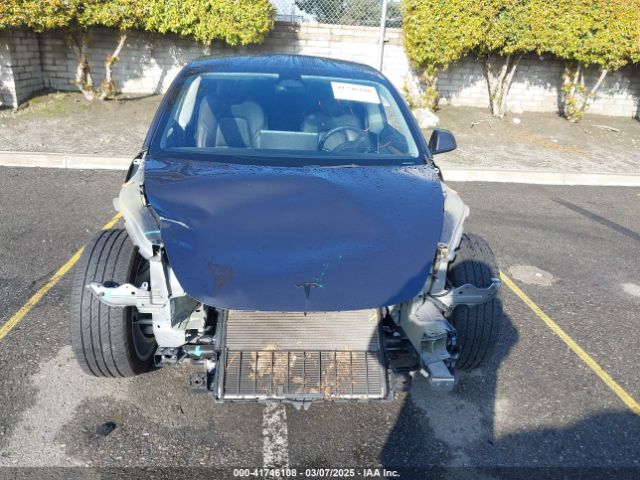 5YJ3E1EB2NF337857 Tesla 2022