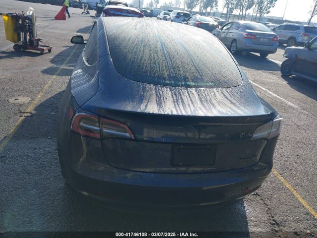 5YJ3E1EB2NF337857 Tesla 2022