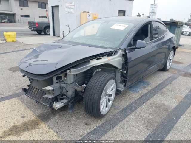 5YJ3E1EB2NF337857 Tesla 2022