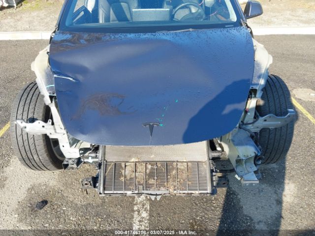 5YJ3E1EB2NF337857 Tesla 2022