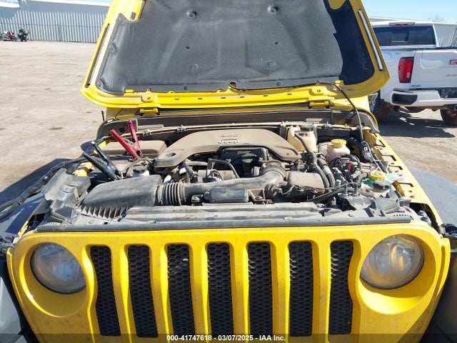 1C4HJXAG5MW691176 Jeep Wrangler Sport 4x4