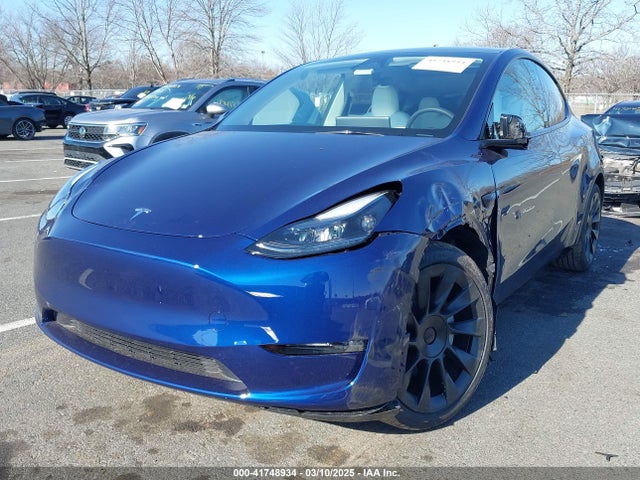 2025 TESLA MODEL Y 7SAYGDEE0SF292850 Photo 1