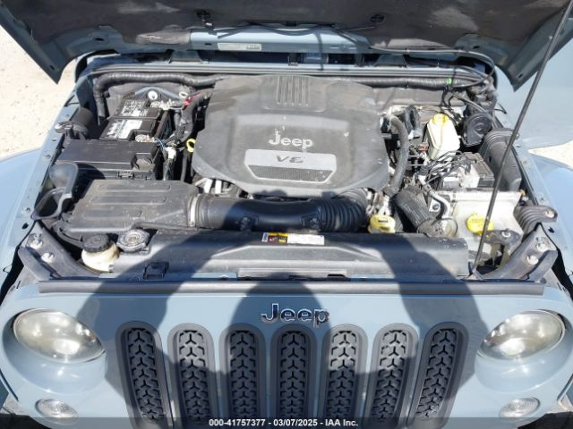 1C4HJWEG7EL104869 Jeep Wrangler Unlimited Sahara