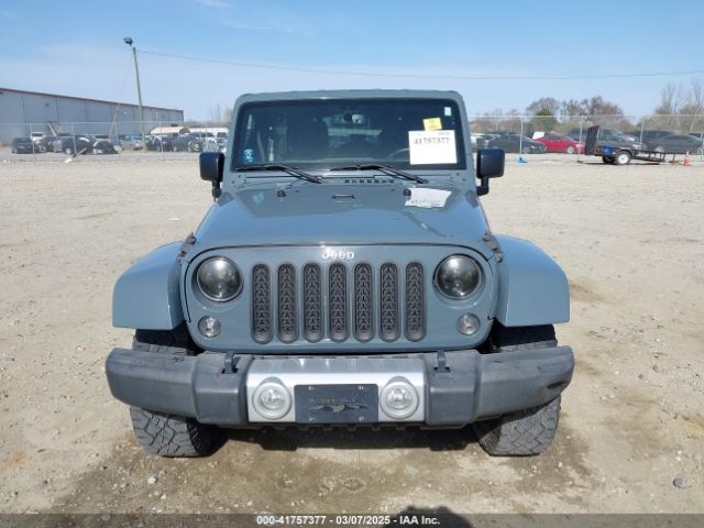 1C4HJWEG7EL104869 Jeep Wrangler Unlimited Sahara