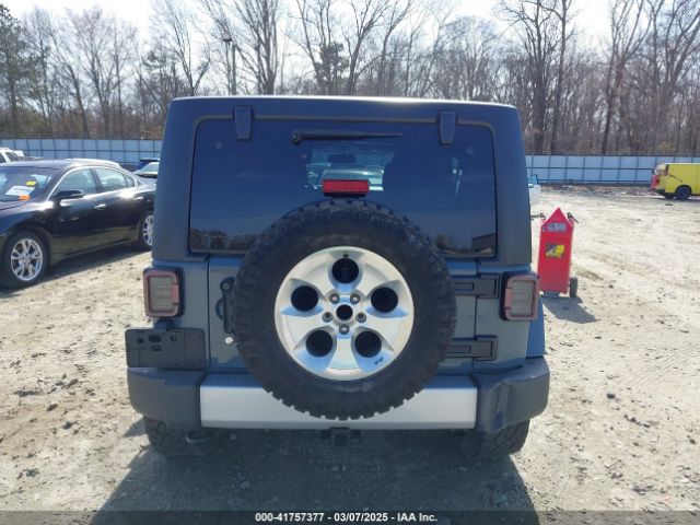 1C4HJWEG7EL104869 Jeep Wrangler Unlimited Sahara