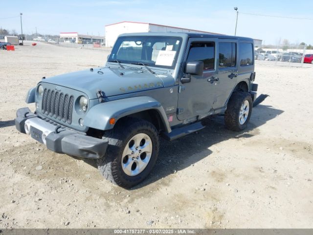1C4HJWEG7EL104869 Jeep Wrangler Unlimited Sahara