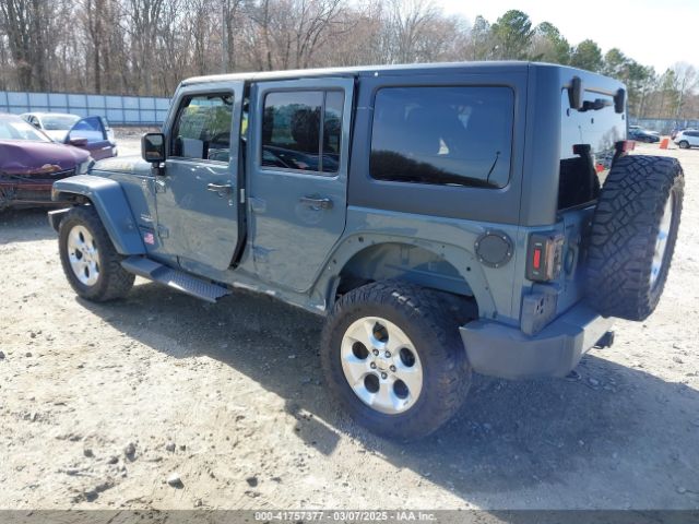 1C4HJWEG7EL104869 Jeep Wrangler Unlimited Sahara
