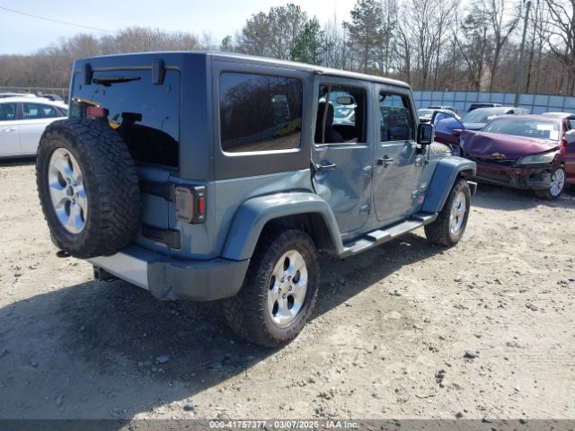 1C4HJWEG7EL104869 Jeep Wrangler Unlimited Sahara