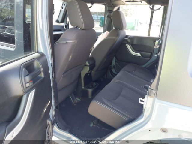 1C4HJWEG7EL104869 Jeep Wrangler Unlimited Sahara
