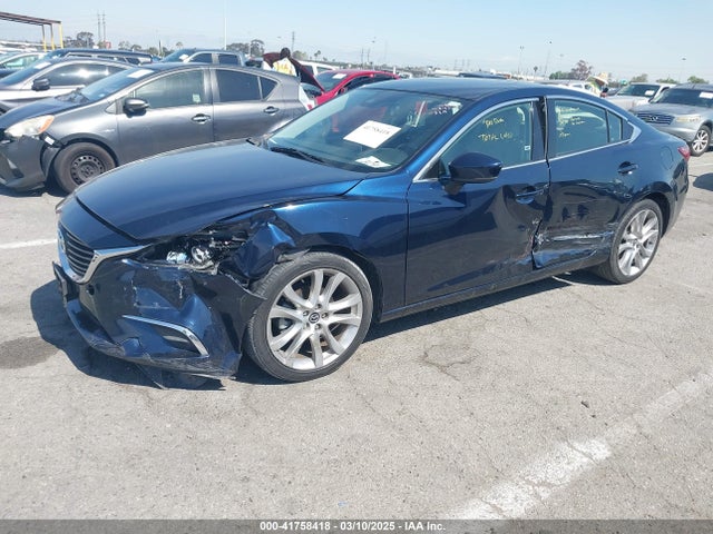 Mazda py 2017 JM1GL1V54H1106599 Image 2