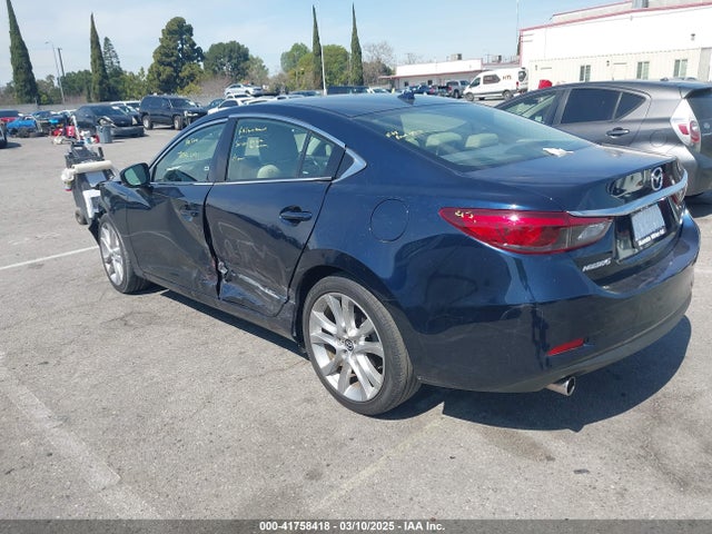 Mazda py 2017 JM1GL1V54H1106599 Image 3