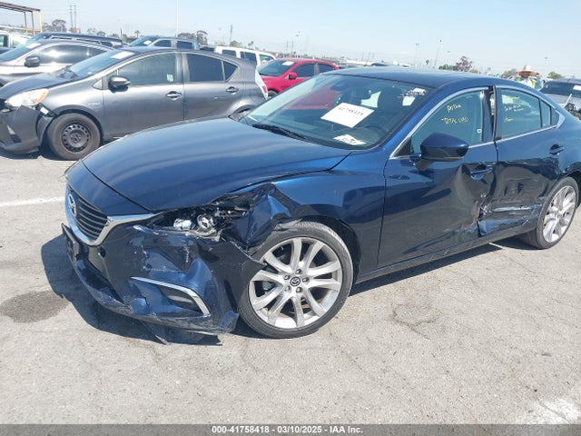Mazda py 2017 JM1GL1V54H1106599 Image 6