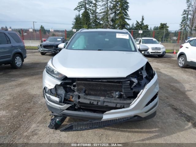 KM8J3CA40GU257379 Hyundai TUCSON SE